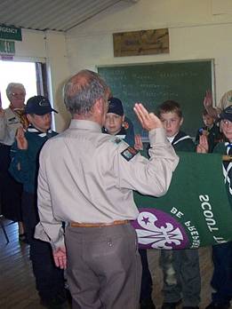 Image of a group of Scouts getting invested at a Badge Night